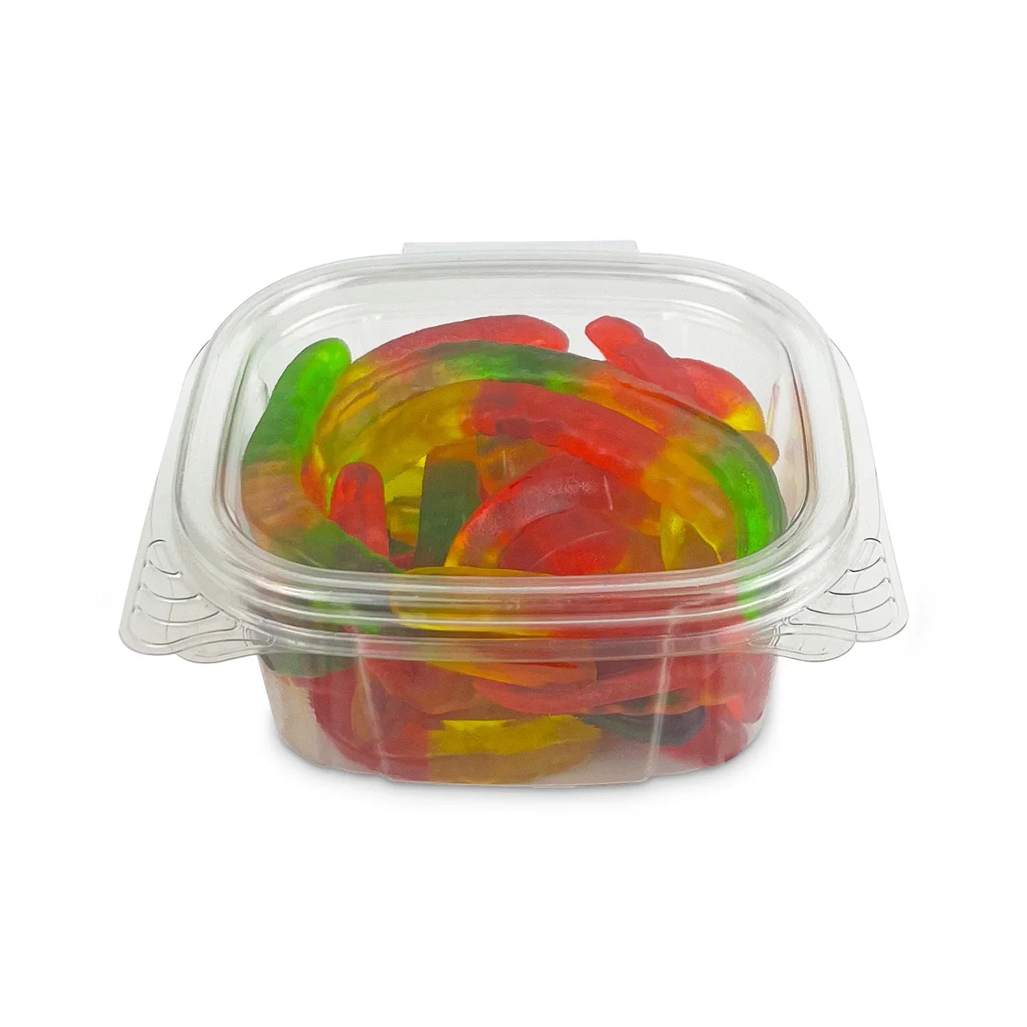 A clear plastic container filled with colorful gummy worms, mostly red, yellow, orange, and green, with a transparent lid.