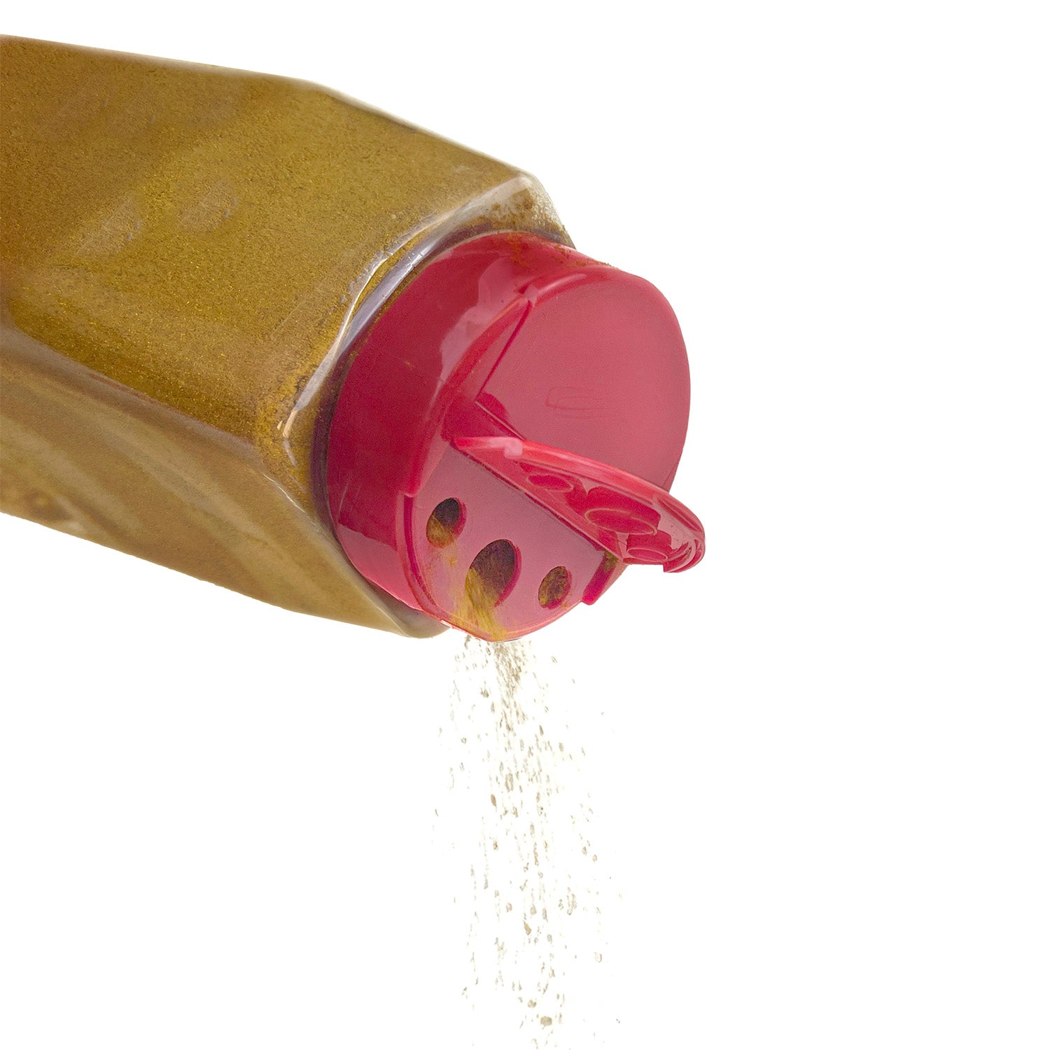 A Red Dual-Flap Spice Cap dispenses yellowish ground spice—likely curry or turmeric—from its plastic container as it is tilted.