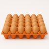 An orange Plastic Stackable Egg Crate holds 30 brown eggs in a 5x6 layout, shown against a plain white background.