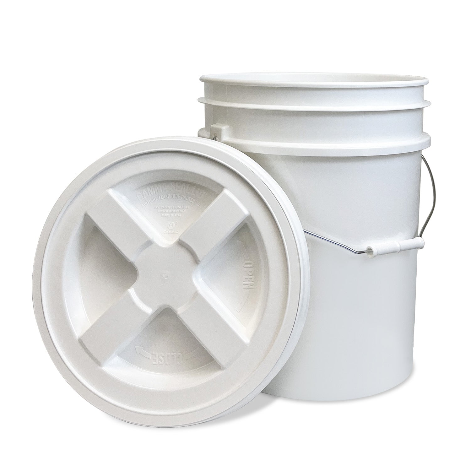 A white plastic bucket with a metal handle, shown with a separate screw-on lid leaning against it. The bucket and lid are both plain and unmarked.