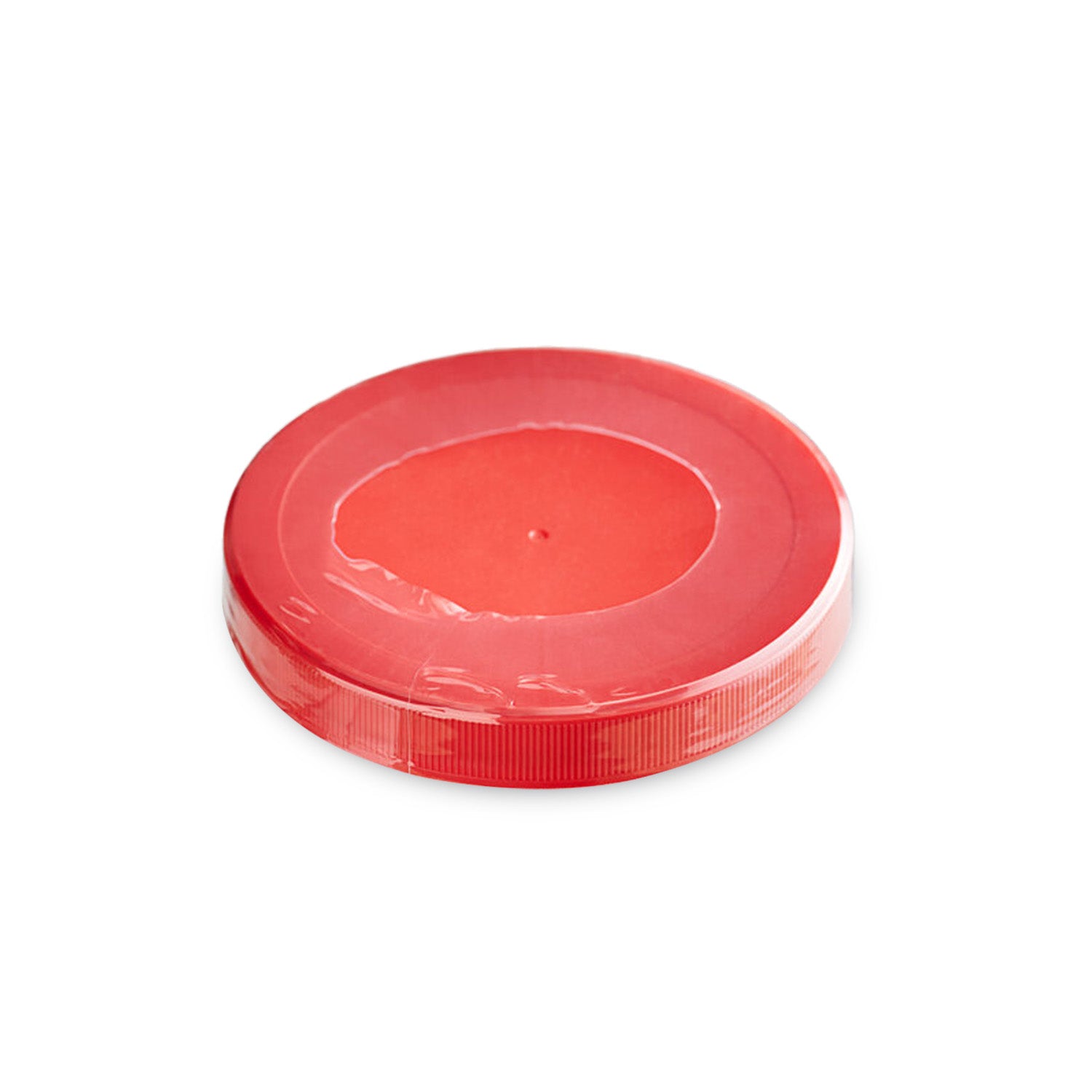 A round, flat, red plastic lid covered with clear plastic wrap, shown on a white background.