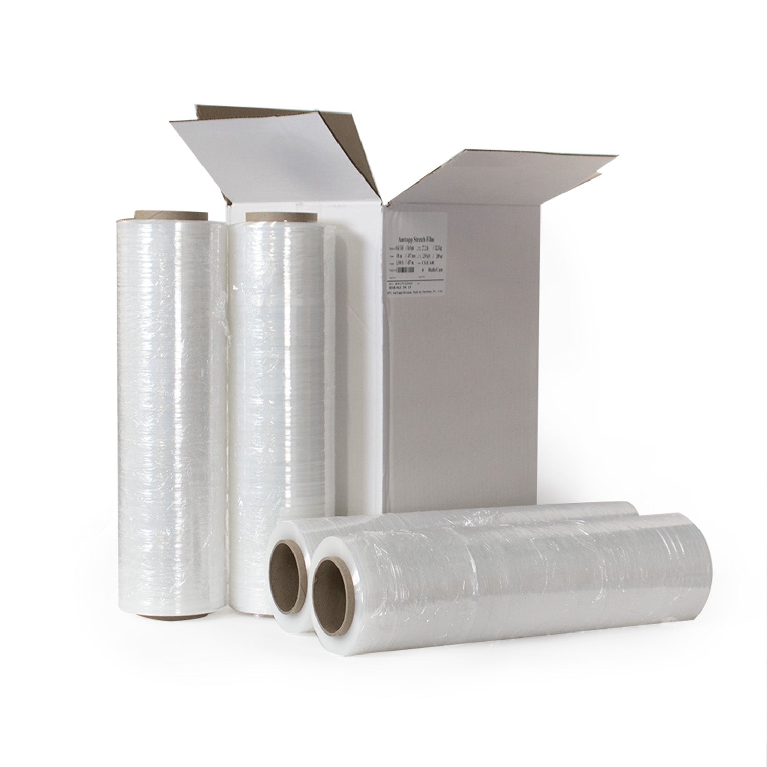 Four large rolls of clear plastic stretch wrap are displayed in front of an open white cardboard box, with two rolls standing upright and two rolls lying horizontally.