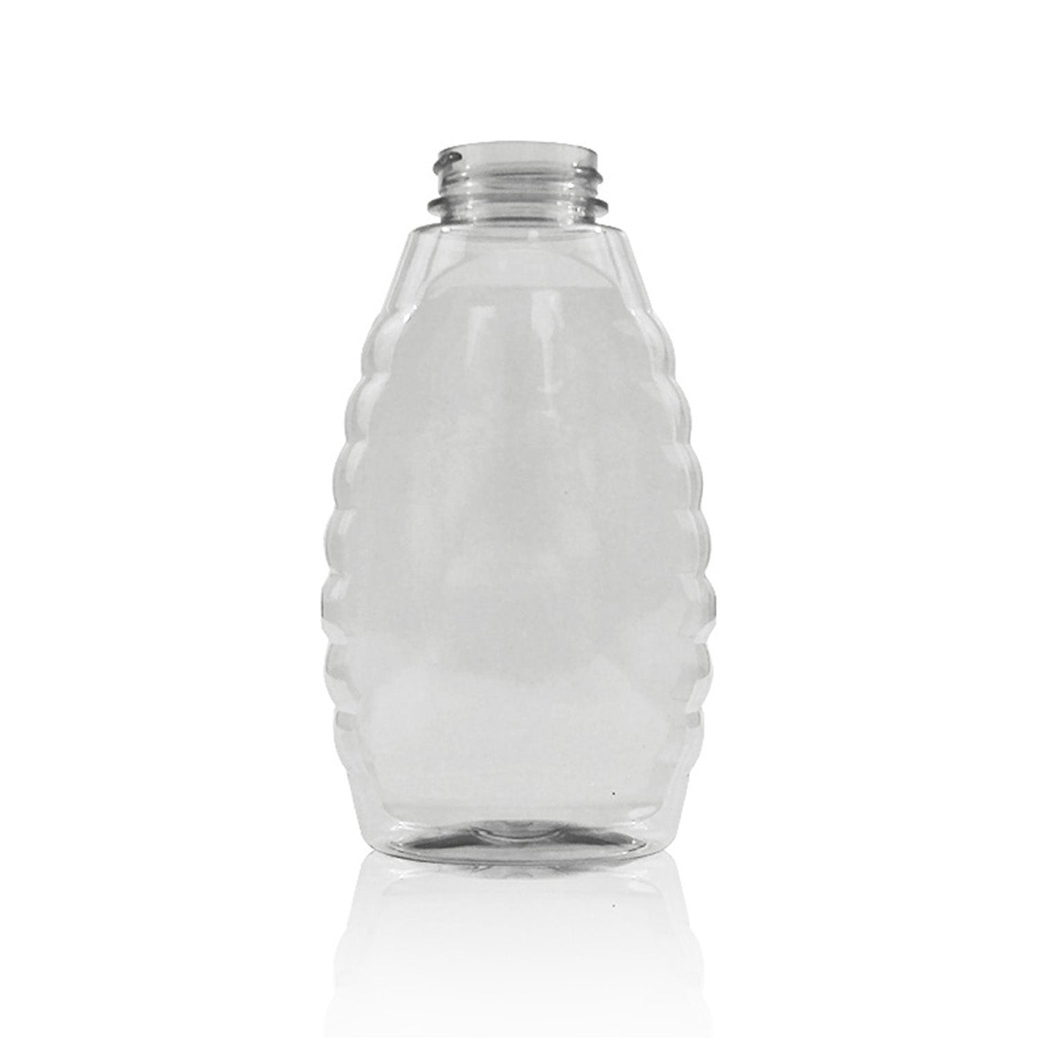 A 16 oz. Inverted Queenline Honey Bottle from a case of 100, clear plastic with a beehive-like ridged oval shape, is shown upright without its cap against a white background.