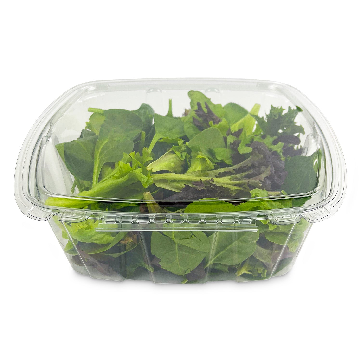 A 64 oz. Tamper-Evident Container - Crystal Seal (case of 140) is shown filled with assorted fresh mixed salad greens, including spinach and leafy greens, on a white background.